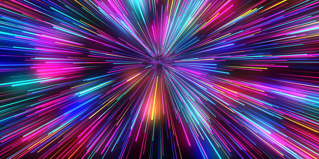 Colorful light streaks radiate outward in a burst pattern on a dark background.