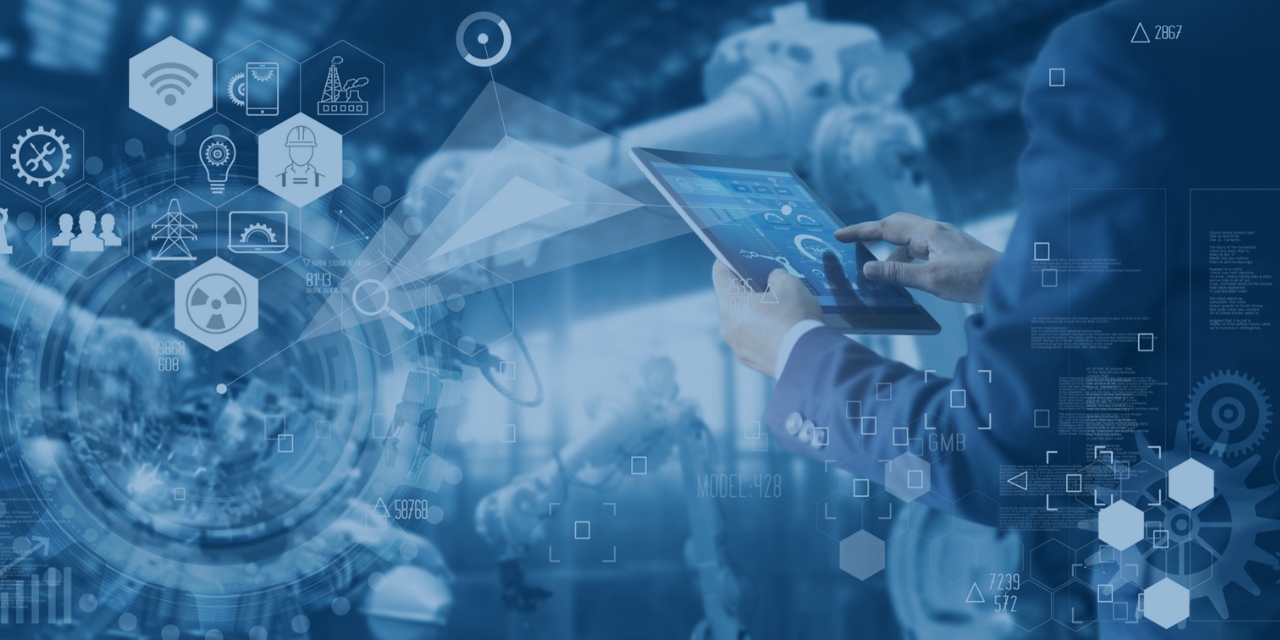 Image of a man in a business suit holding an iPad overlaid with digital icons.